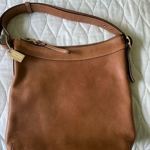 Light brown Coach bag.